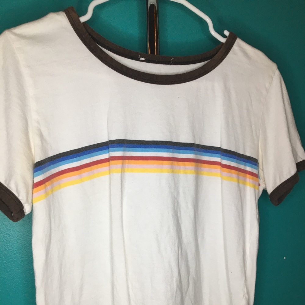 White rainbow shirt with brown outline of shirt